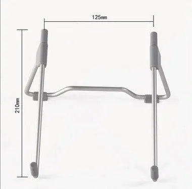 Grey aluminium alloy and engineering plastic mobile phone and laptop stand on a desk.
