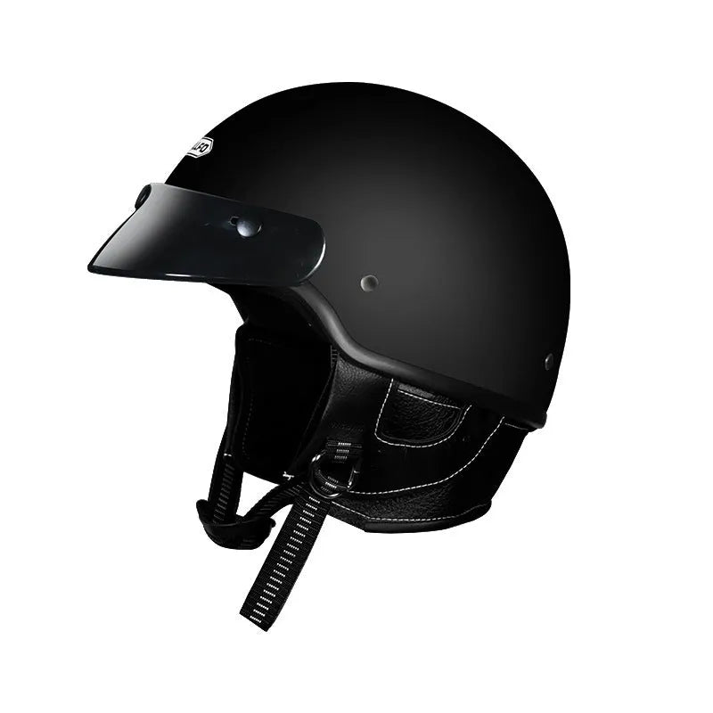 Retro biker-style motorcycle helmet in cement grey colour with ABS shell construction.