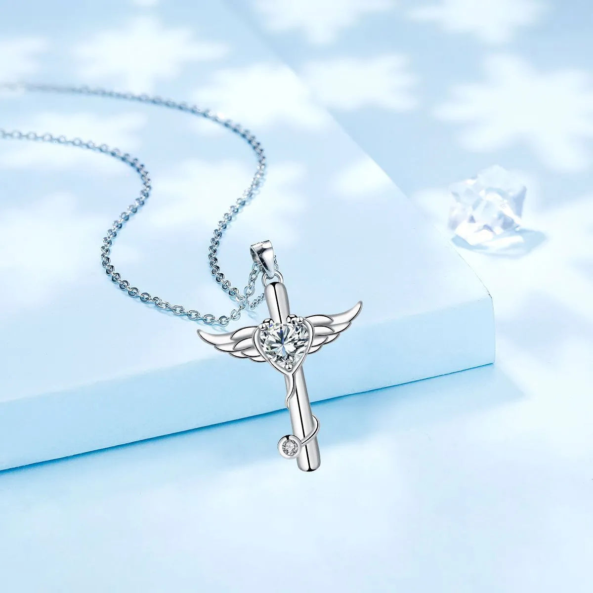 Women's copper wings cross stethoscope necklace with electroplated finish in red diamond colour option