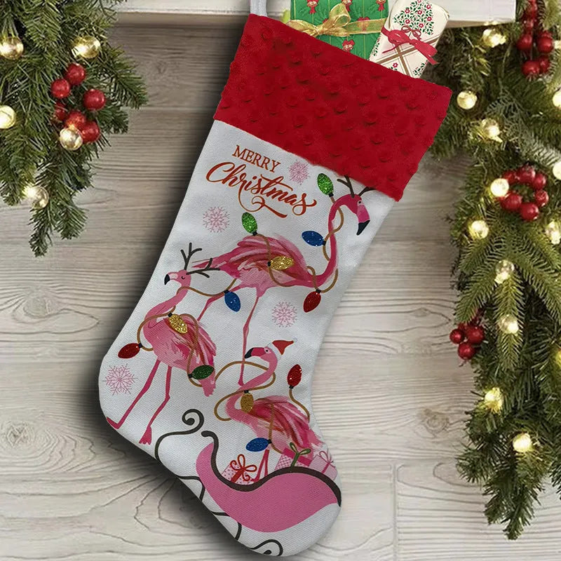 Flamingo design cloth Christmas stocking measuring 46 by 28 centimetres.
