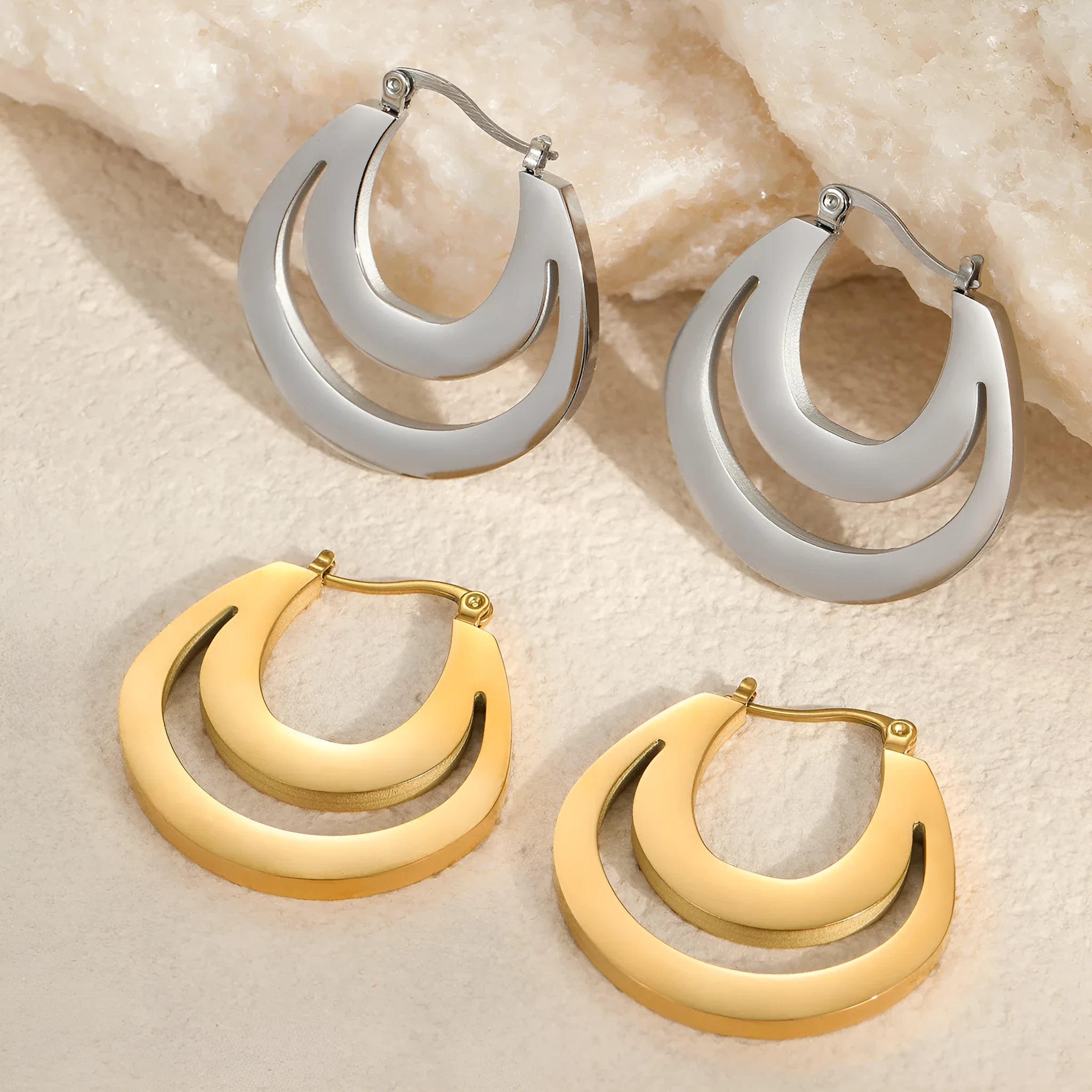 Geometric French minimalist earrings in gold or steel plating with circular ring design