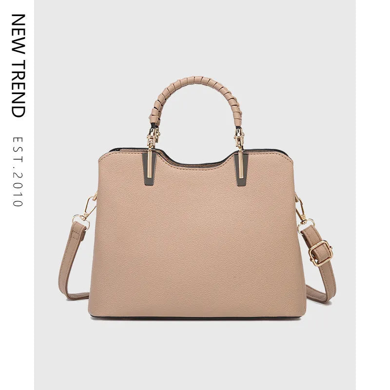 Western style PU crossbody handbag in beige, horizontal square 25x12x19cm, with stitching and contrast colour details.
