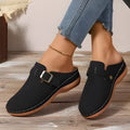 Women's casual wedge slipper in light brown with cloth upper and rubber sole.