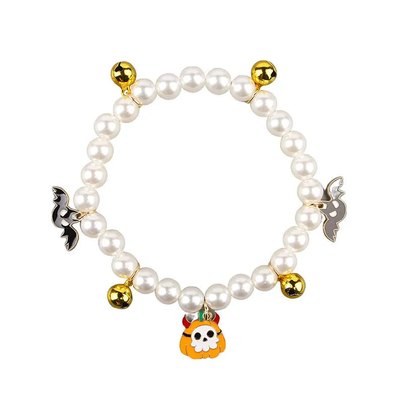 Halloween cat collar with pearl necklace decoration showing three pumpkin design variations