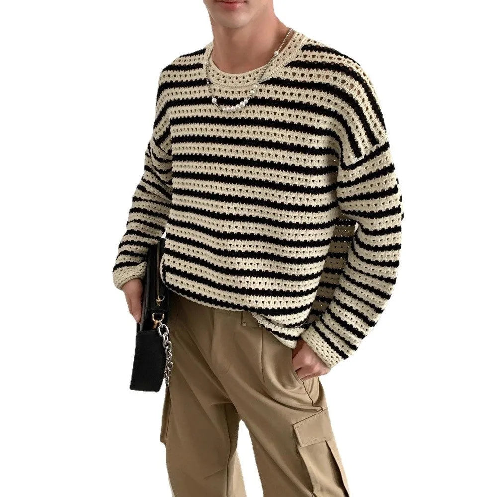 Men's black cotton blend long sleeve loose fit sweater on a hanger, front view