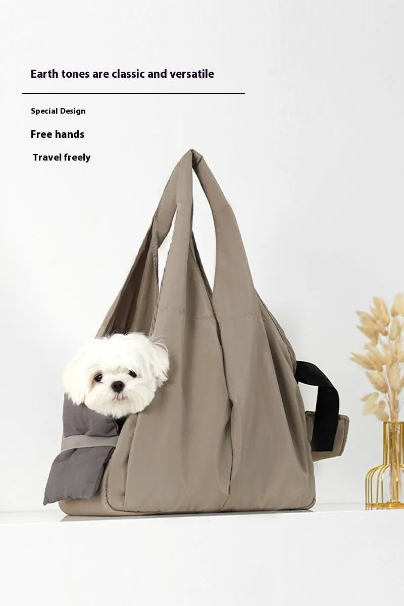 Apricot-coloured cloth pet handbag for small dogs and cats showing dimensions of 41cm by 16cm by 28cm