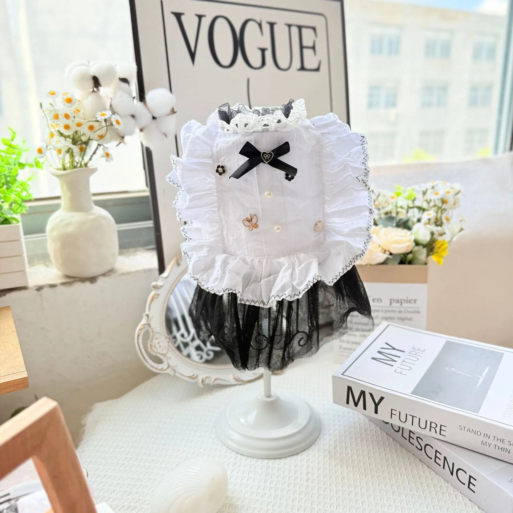 White princess-style gauze skirt dog dress on a mannequin, showing the layered skirt design.