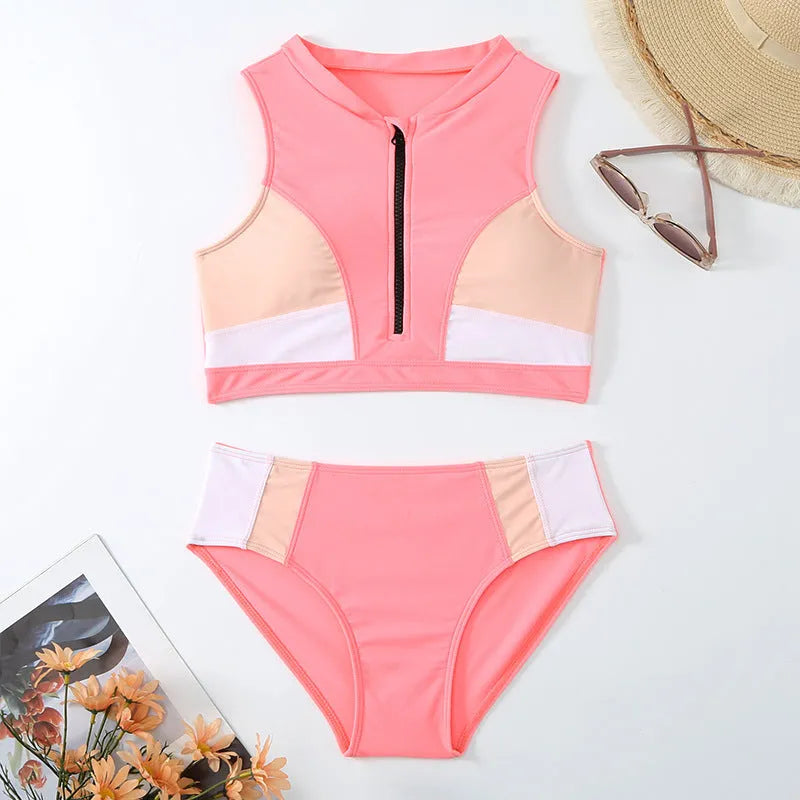 Pink high-waist split leg bikini swimsuit on a hanger, showing brief style and solid colour.