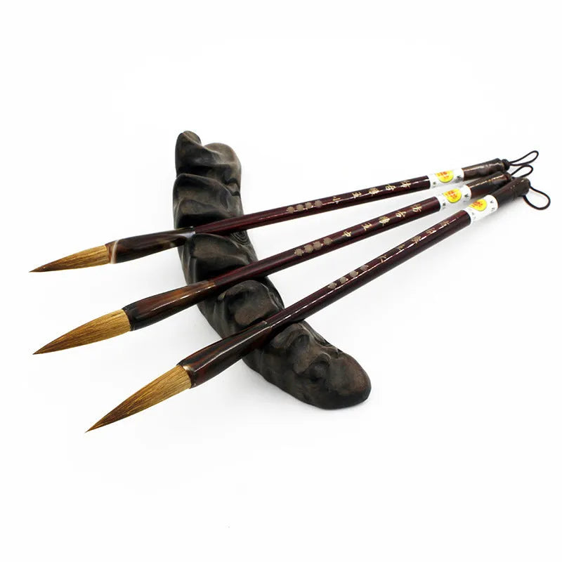 Traditional Chinese wolf hair calligraphy brush set with steel rod construction in three sizes