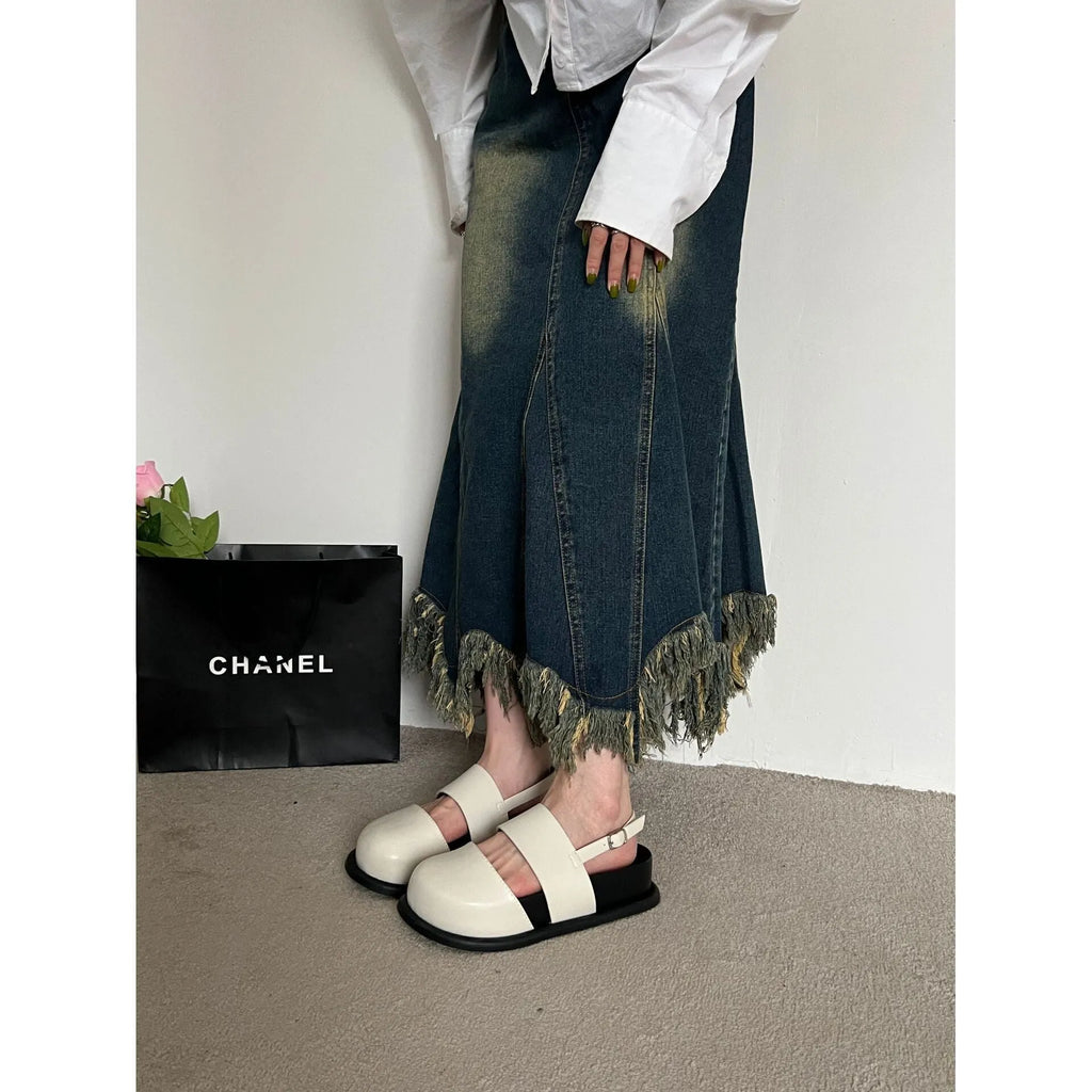 Retro raised sandals with ankle strap buckle in apricot colour showing closed toe design