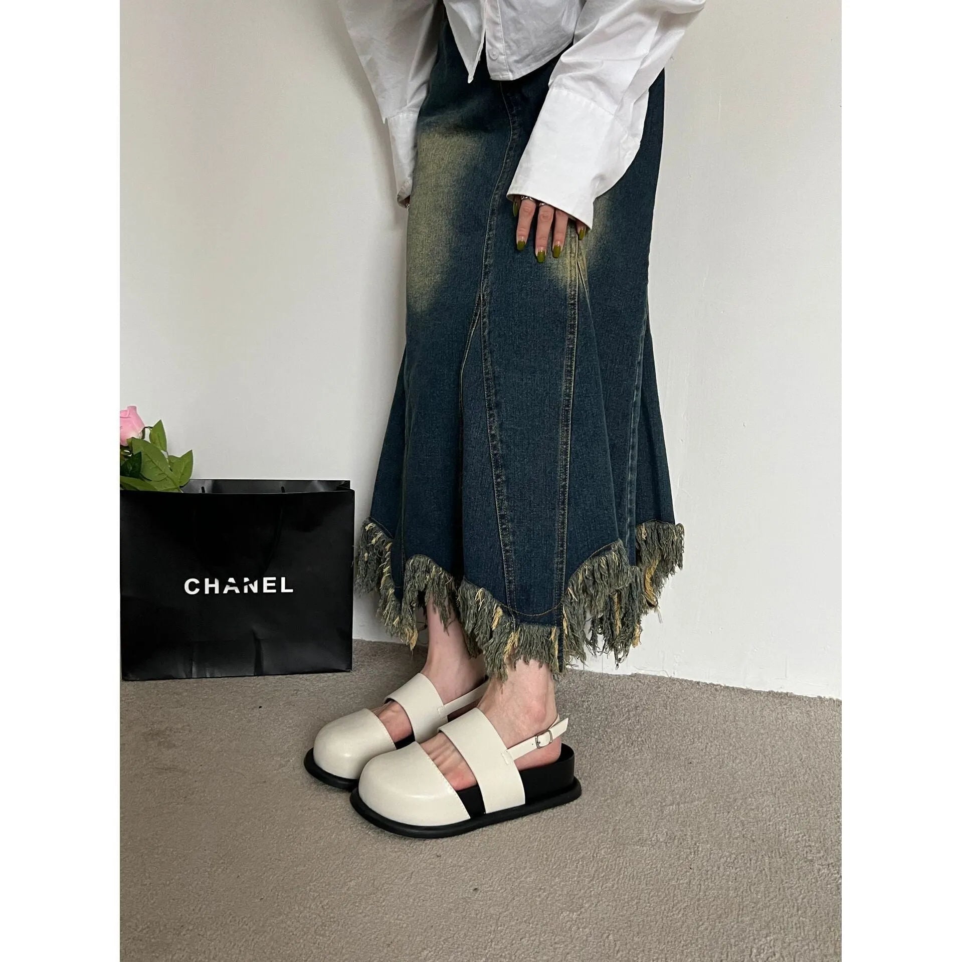 Retro raised sandals with ankle strap buckle in apricot colour showing closed toe design