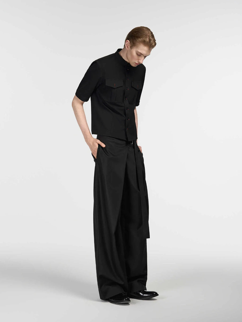 Black straight-leg trousers with adjustable waist and single pleat detail in Tencel cotton fabric