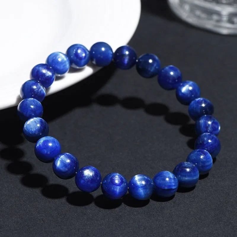 Natural blue crystal ball bracelet with spherical beads and traditional Ruyi charm, available in multiple sizing options