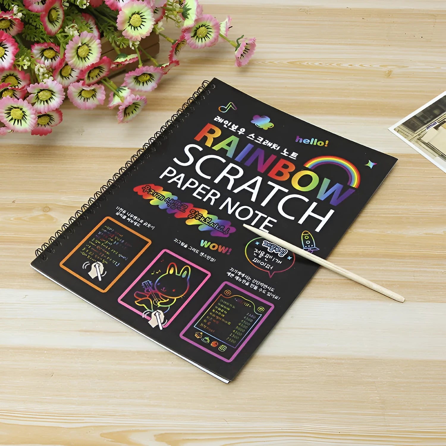 Children's large scratch art paper with colourful puzzle design revealed through scraping technique