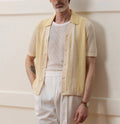 Bright yellow hollow-out short-sleeved polo shirt with asymmetrical design on Tencel fabric
