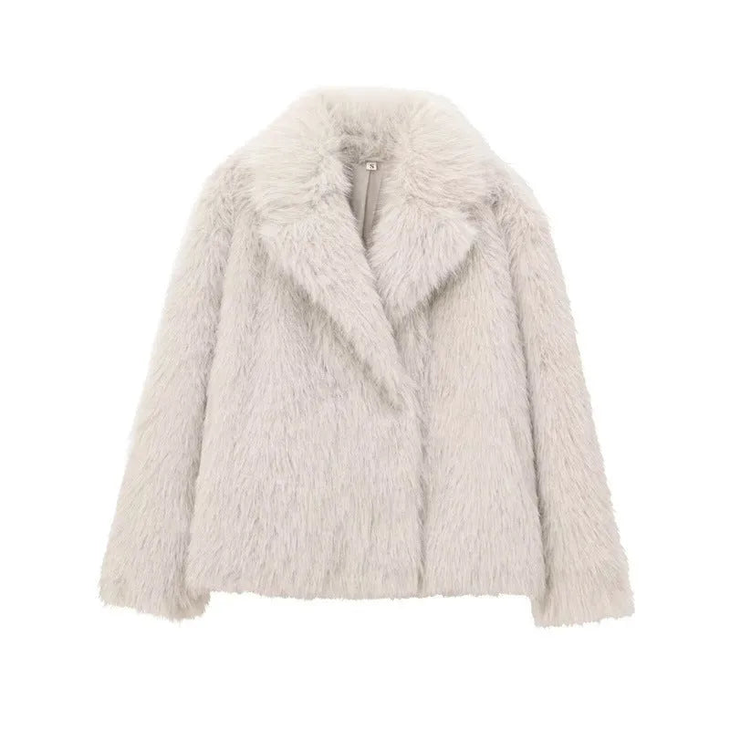 Women's white faux fur jacket with lapel collar and long sleeves shown on mannequin