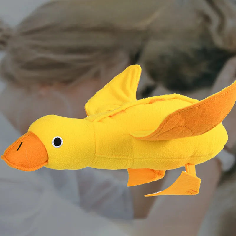 Yellow plush teddy dog toy with squeaker duck sound and treat holes