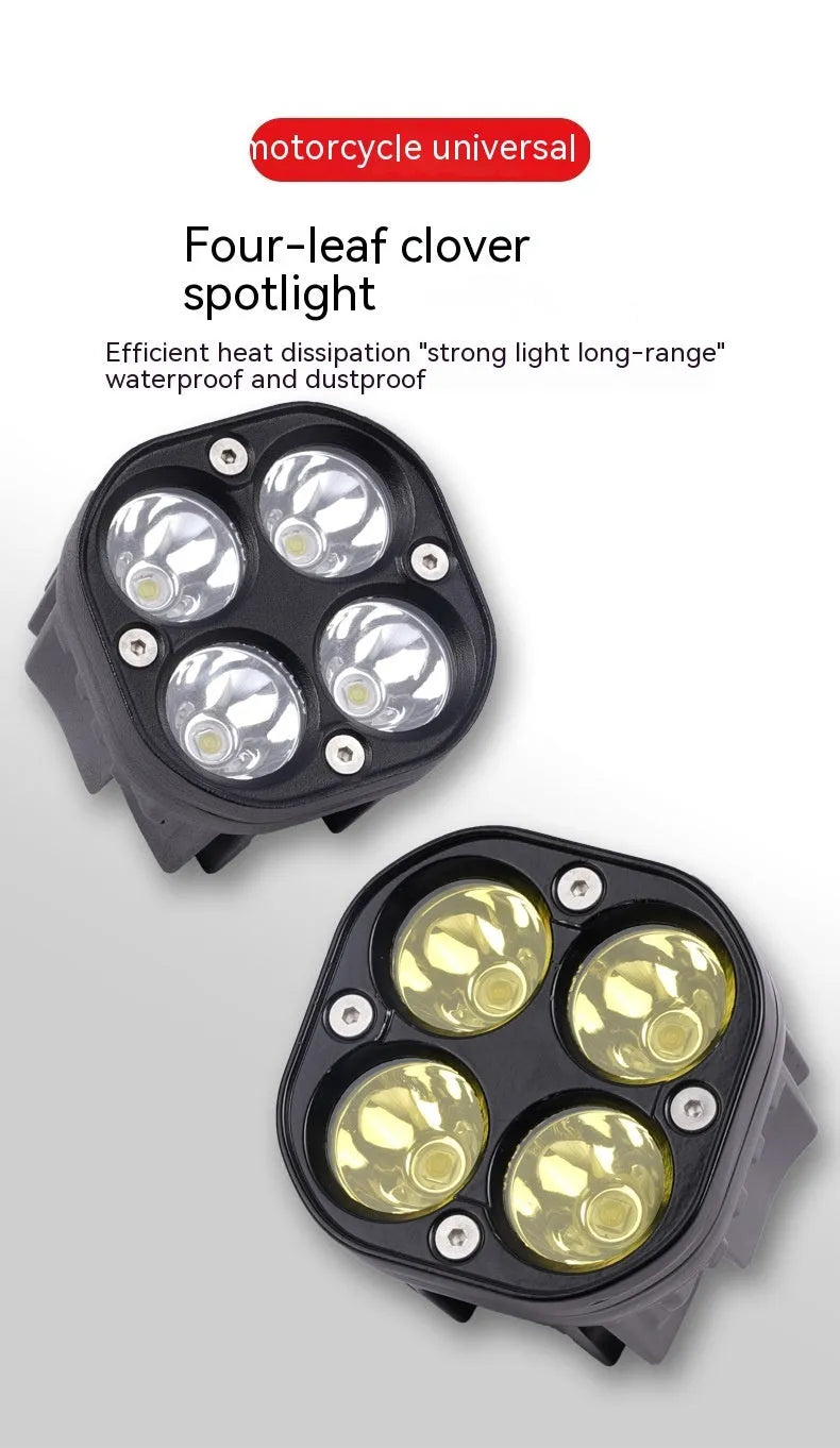 Four-eye clover spotlight headlight with aluminium base plate for vehicle modification.