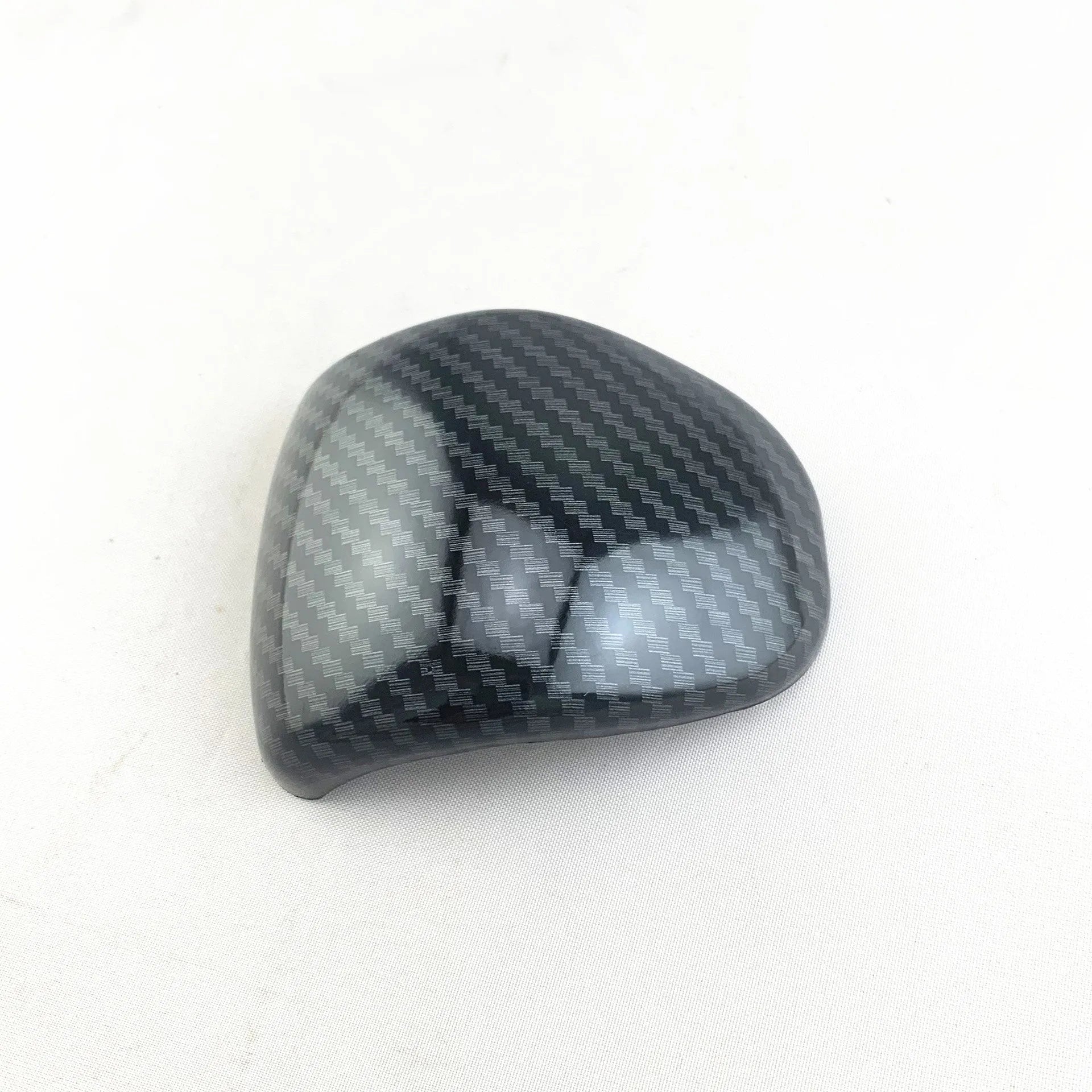 Car gear shift cover in carbon fibre pattern made from ABS plastic