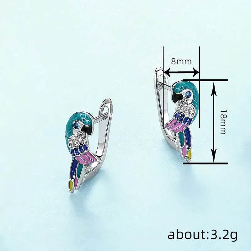 White gold colour copper ear clip with parrot bird ornament and inlaid zircon stones