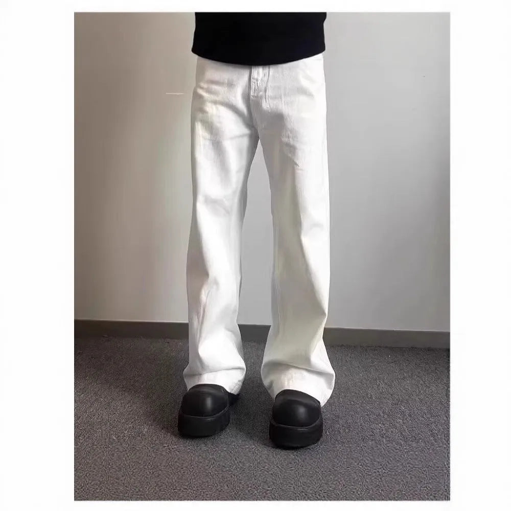 Men's high-grade white loose straight leg denim jeans on a mid-waist.