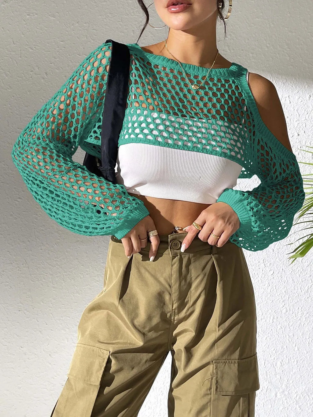 Sexy navel hollowed mesh shirt for beachwear in polypropylene fabric, shown in multiple colours.