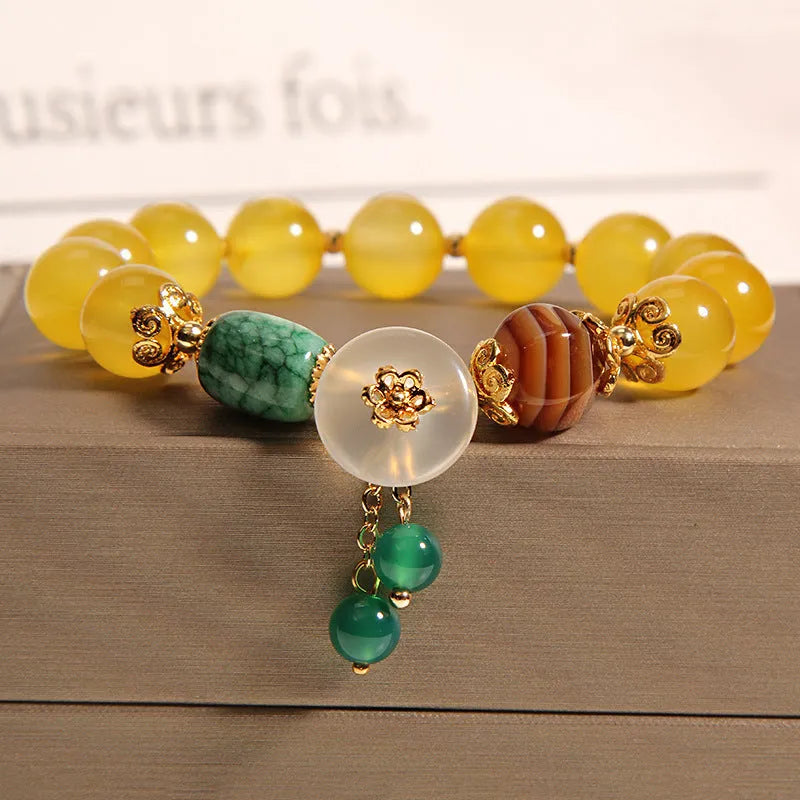 Yellow agate crystal bracelet with gold silk thread and adjustable sliding knot closure