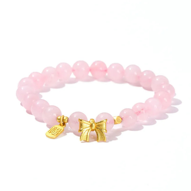 Crystal agate bracelet with natural gemstone beads and zodiac charm on a wrist.