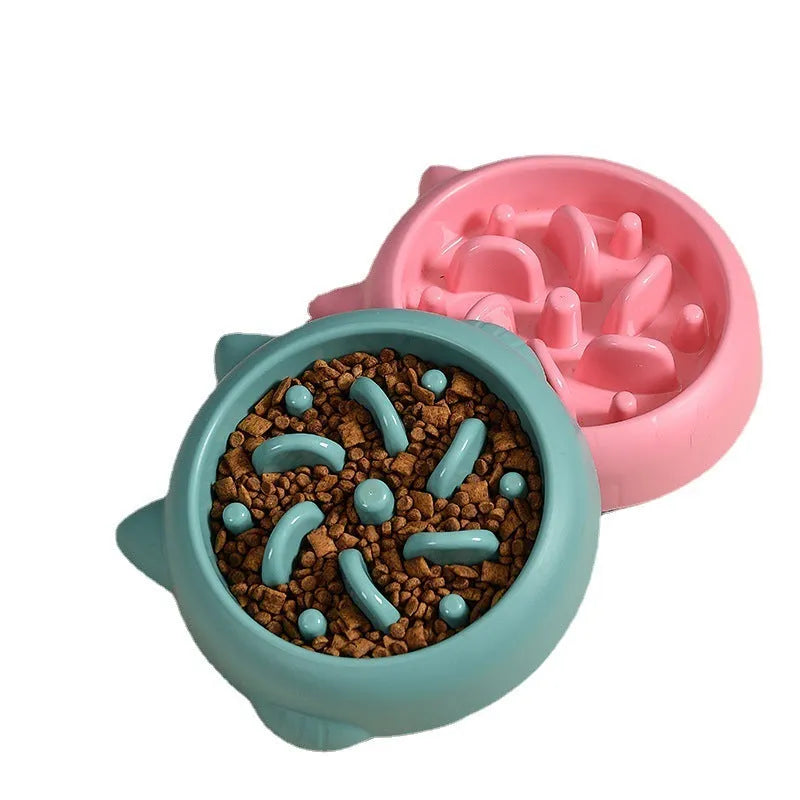 Green bone-shaped slow feeder dog bowl with internal ridges for anti-gulping feeding.
