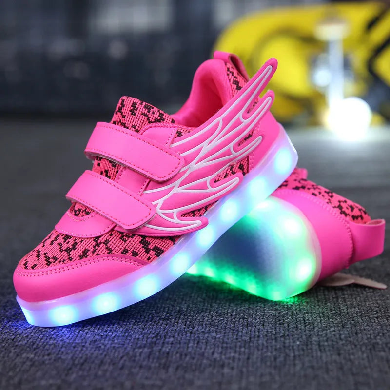 Plum red children's LED light-up sneakers on a white background, showing USB charging port.
