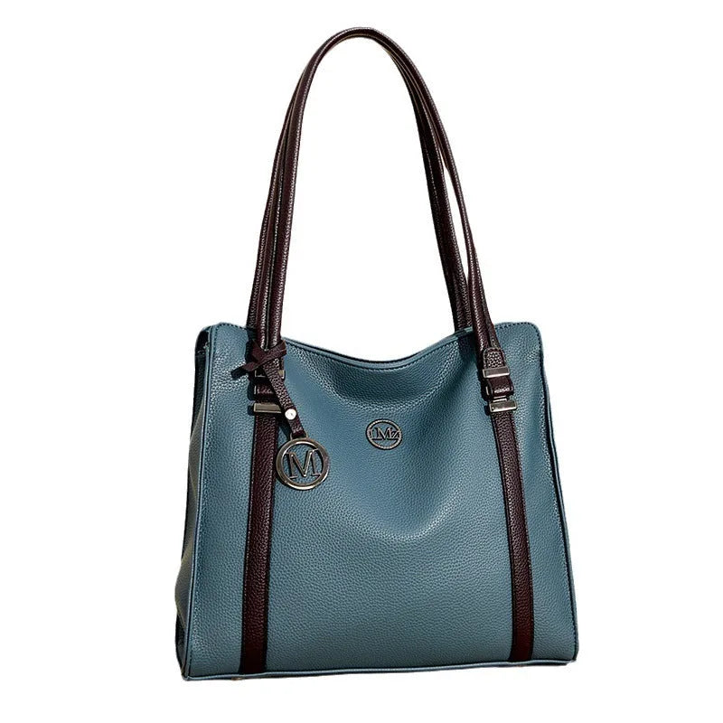 Women's large horizontal square crossbody bag in soft PU material, shown in wine red colour with double shoulder straps.