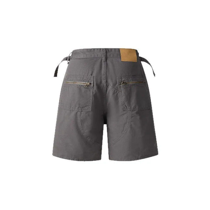 Retro workwear shorts in washed cotton fabric with loose fit and half elastic waistband