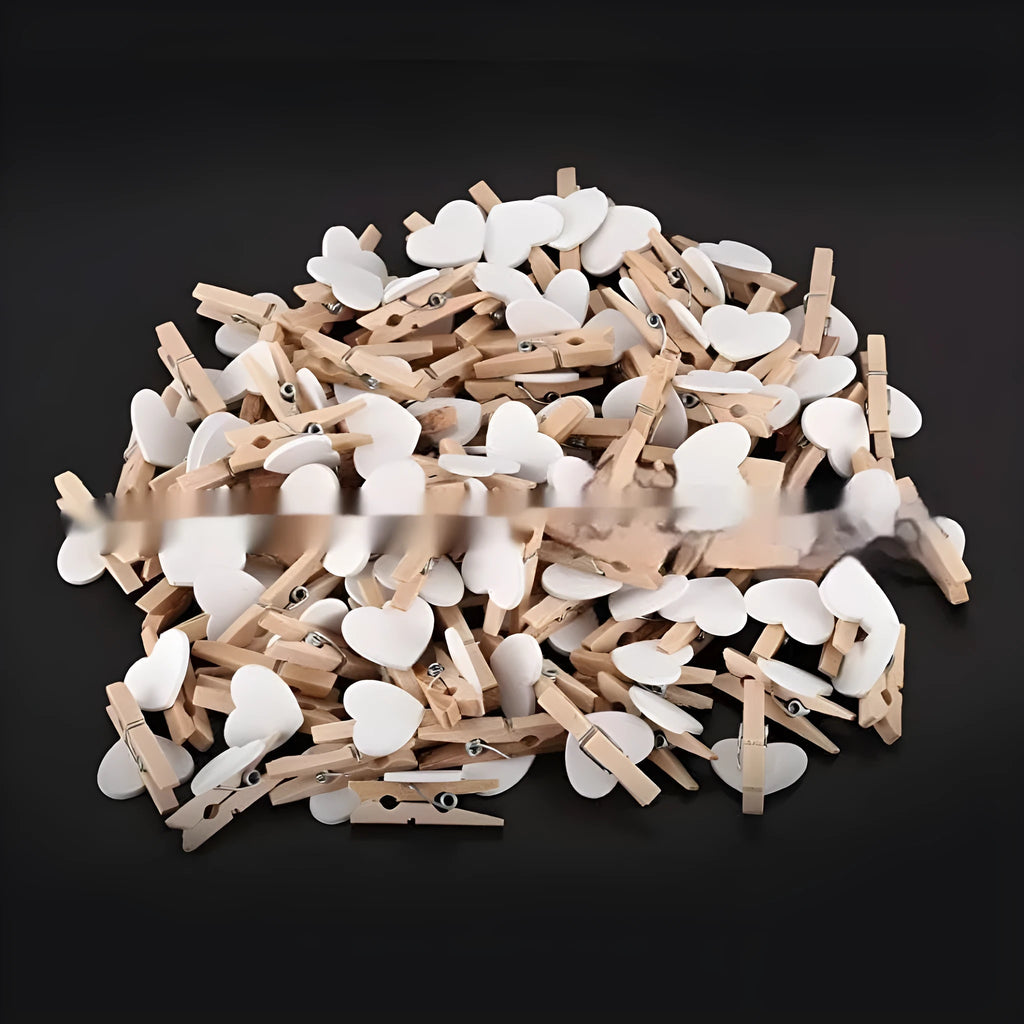 Set of five handmade solid wood heart-shaped hair clips in red, white, pink, yellow and rose.