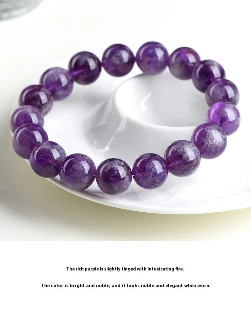 Natural Snow Mountain Purple feather amethyst crystal bracelet with geometric Ruyi pattern.