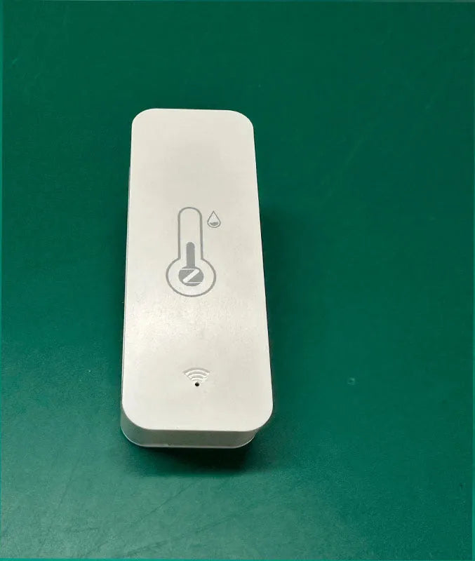 White rectangular WiFi temperature and humidity sensor with compact dimensions for smart home monitoring
