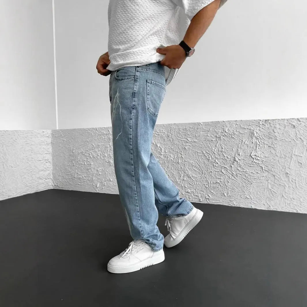 Blue men's straight-leg denim jeans with mid-waist design and zipper fly closure