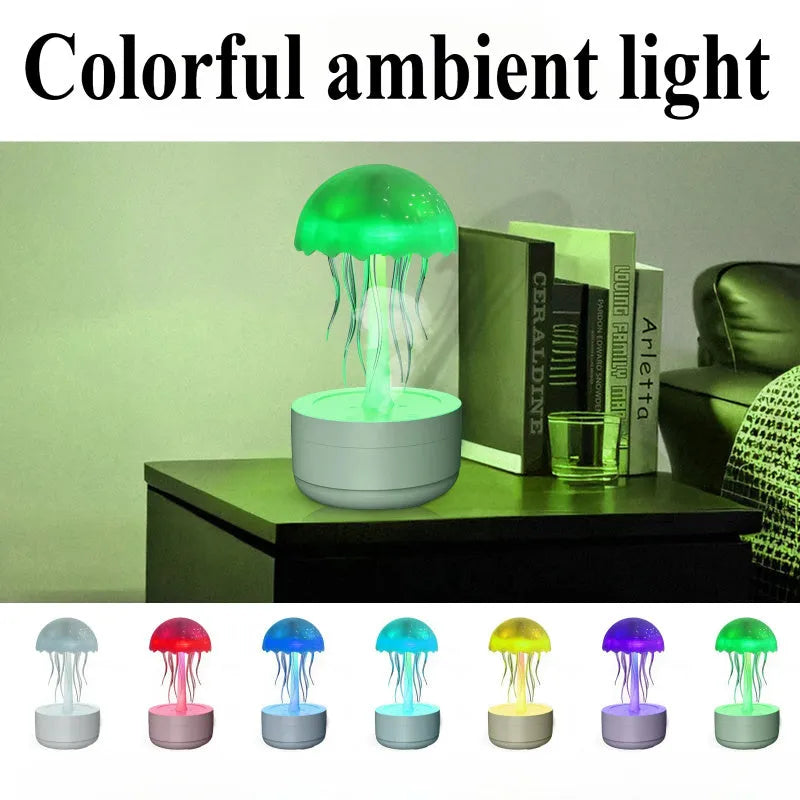White jellyfish-shaped humidifier and essential oil diffuser with colourful night light on a desk.