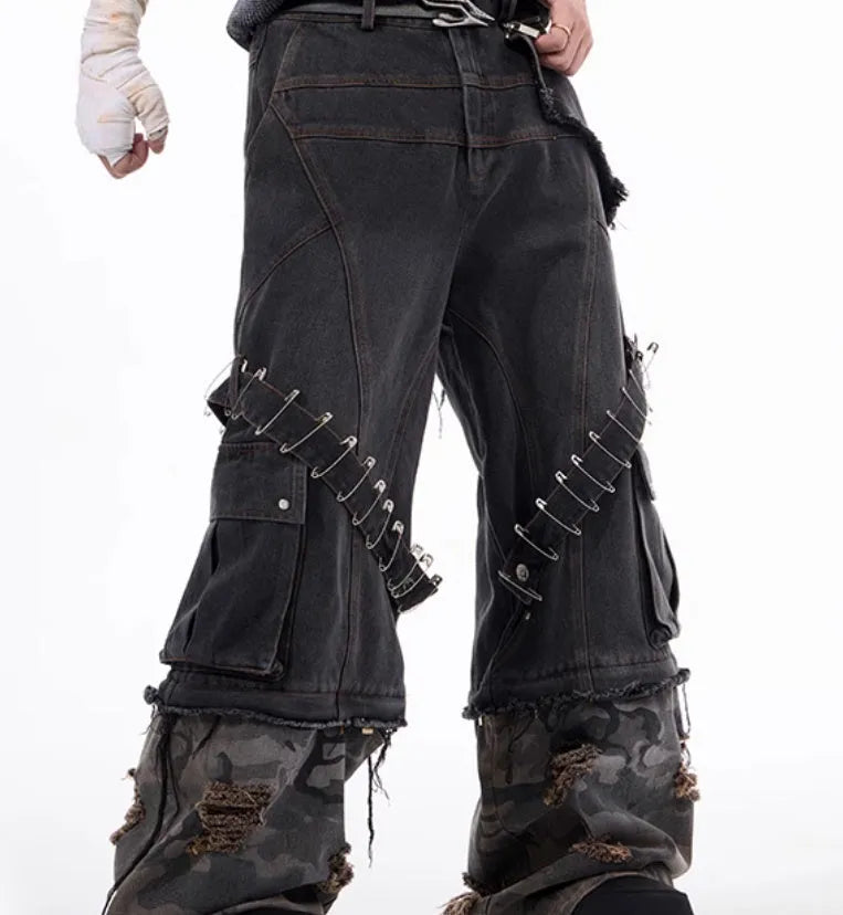 Grey men's camouflage jeans with splicing construction and pin details on cotton denim fabric