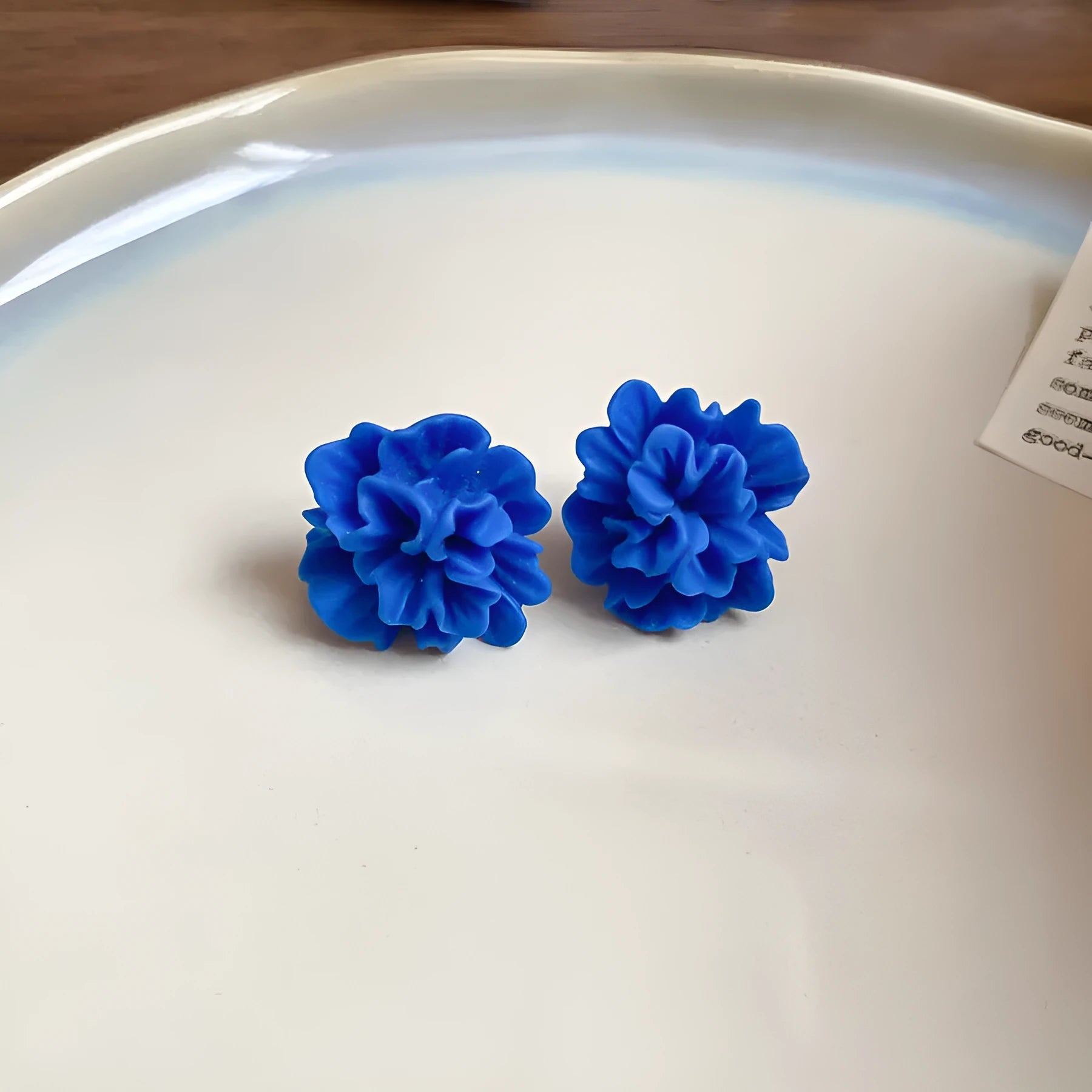 Women's geometric earrings with cloth construction and silver needle blue colour featuring round design elements