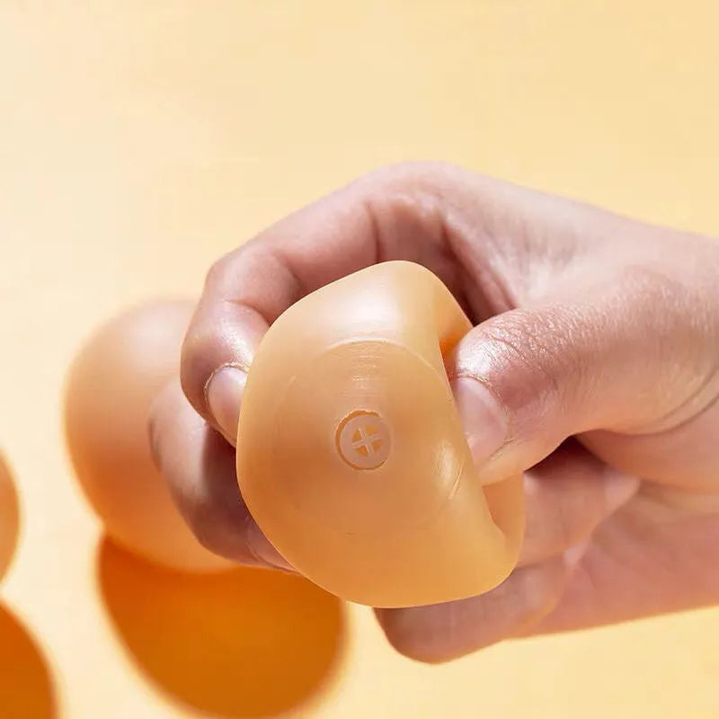 Simulation egg dog toy with light-up features and textured surface for tooth cleaning