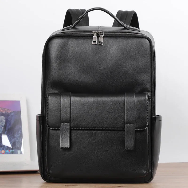 Large black leather men's computer backpack with weaving detail and a physiological curve back.