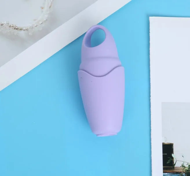 Massage ice tray for face, under-eye and clavicle use, available in purple, blue, pink or black