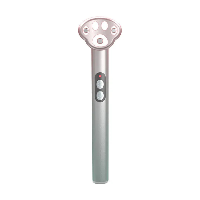 Pink cat's paw shaped eye massager with micro-current vibration and colour light function