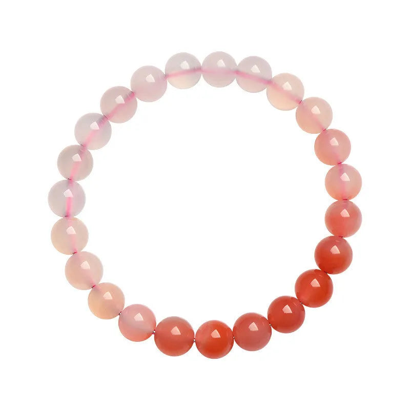 Yanyuan agate bracelet with gradient colours showing beads in a geometric style on a wrist.