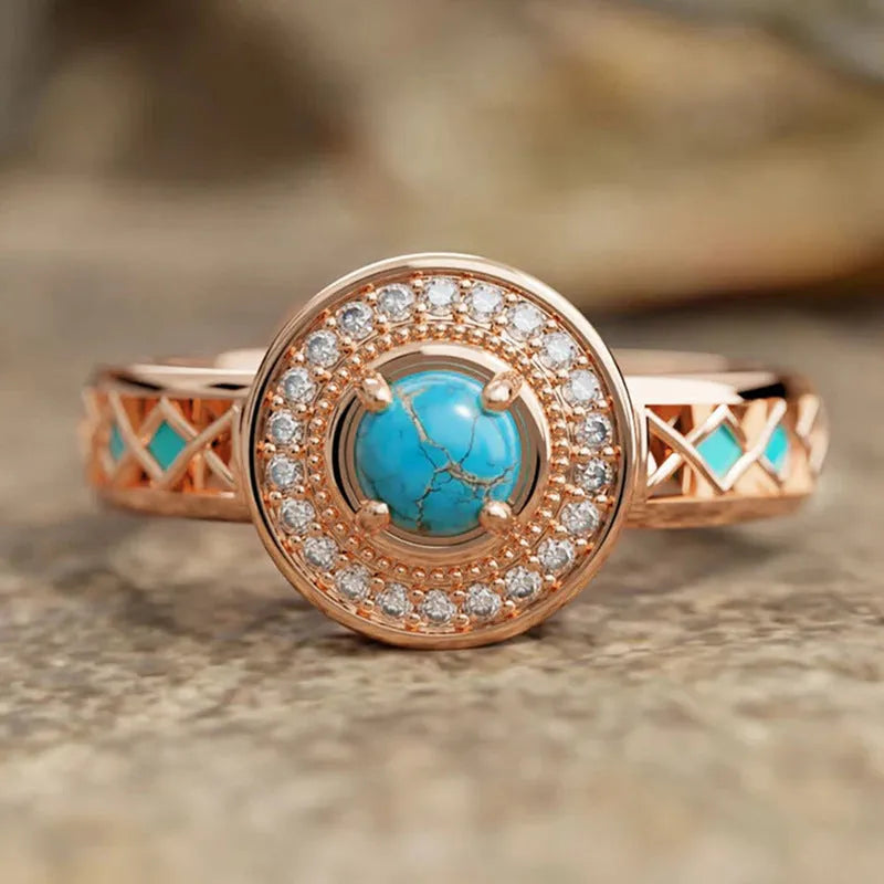 Women's turquoise geometric ring with micro-inlaid zircon on rose gold copper band.
