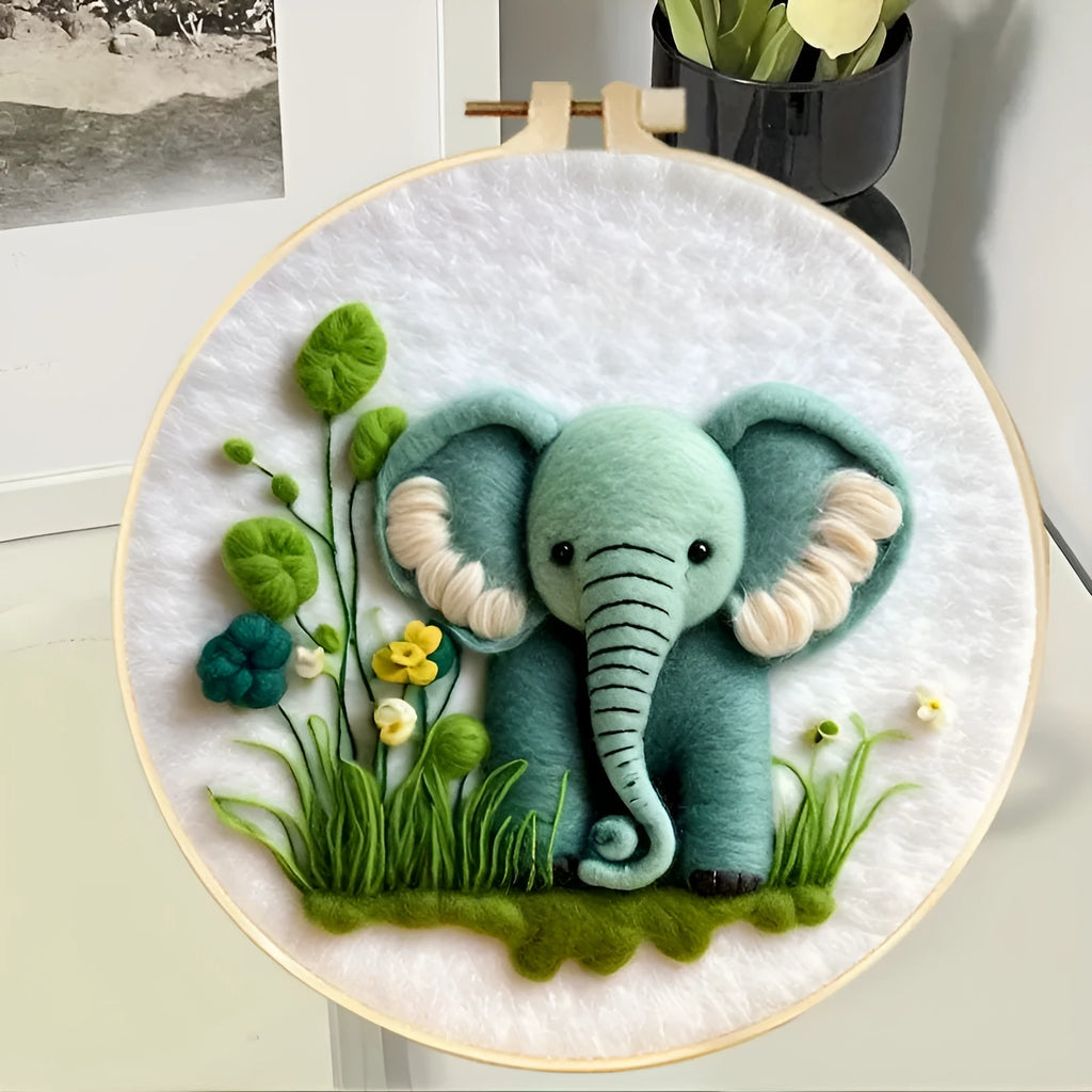 Round three-dimensional wool felt embroidery on linen with floral pattern in embroidery frame