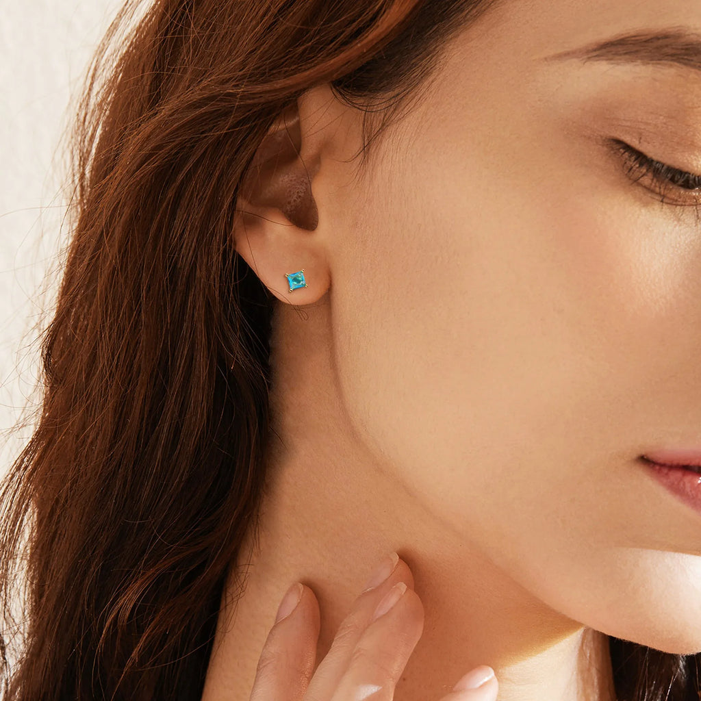 Brass gold-plated drop earrings with pear-shaped zircon stones in candy colours