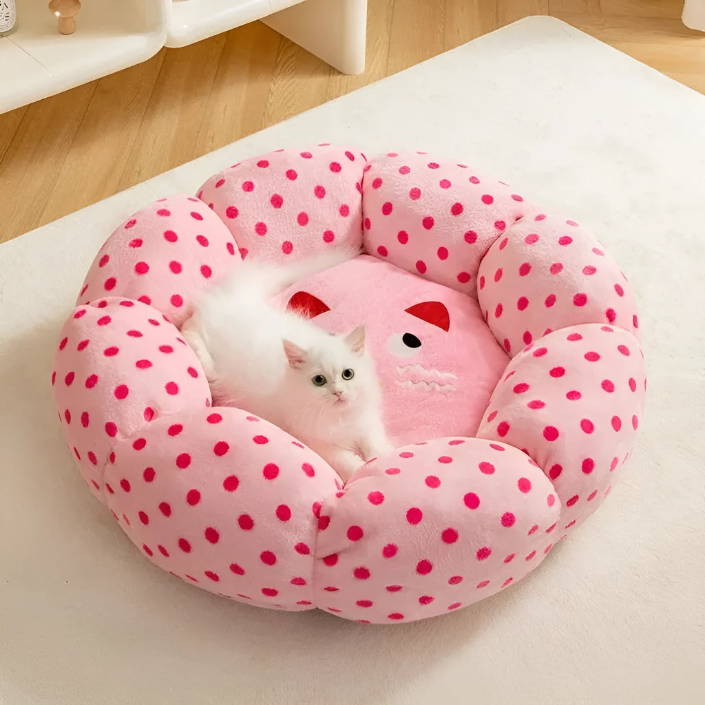 Pink dot pattern fabric cat bed shown in 45cm and 65cm diameter sizes