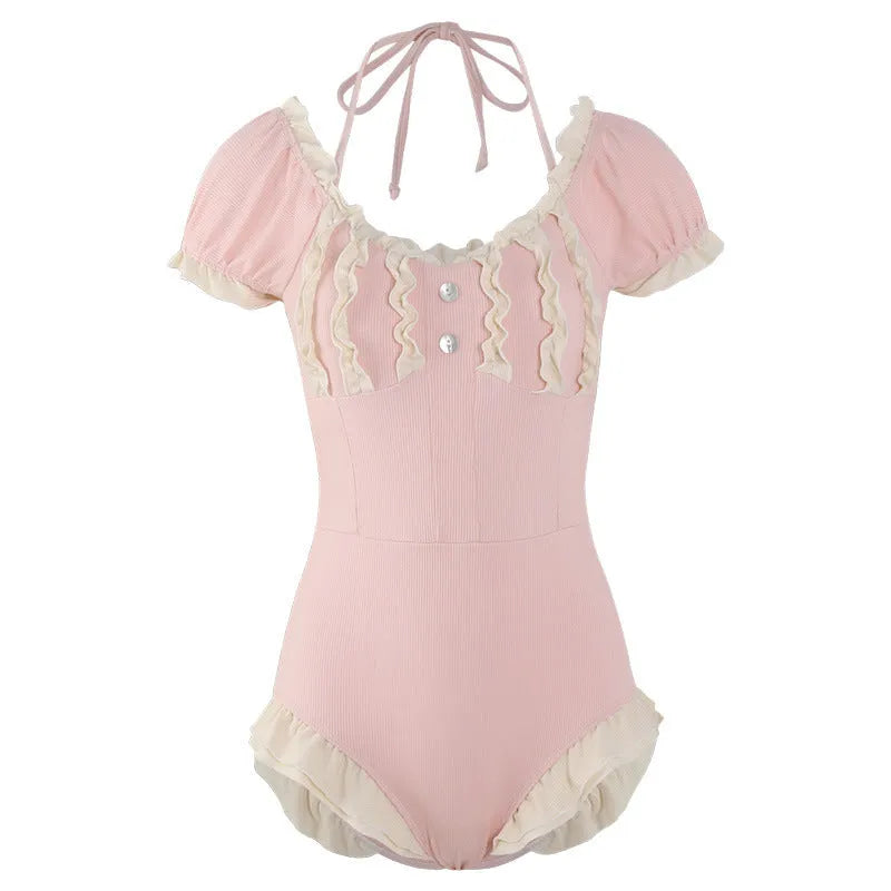 Women's pink one-piece swimsuit with conservative coverage and Siamese cat cute design