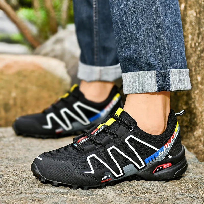 Men's grey orange plus size casual running shoes with synthetic leather upper and rubber sole.